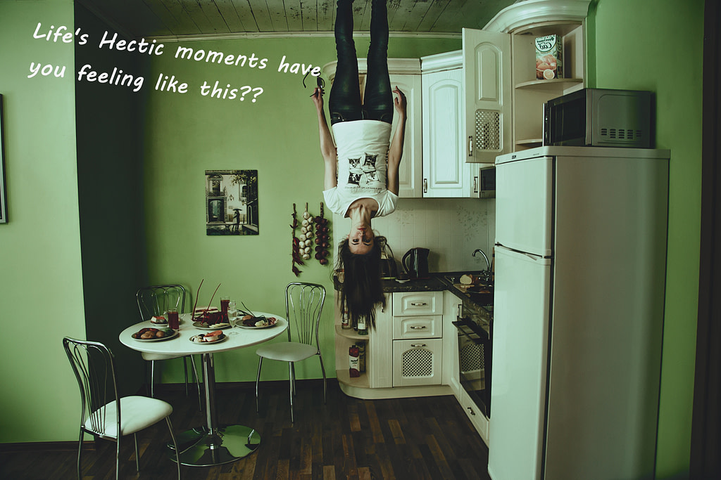 Picture of a person standing upside down on the ceiling in a messy kitchen with their hair hanging upside down on end. text caption:
"Life's Hectic moments have you feeling like this??" Hire Marth Cleaning for your Home Cleaning